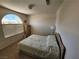 Bedroom with a light floral bedspread, window with blinds, and a dresser; a calm relaxing retreat at 10968 Geyser Peak St, Henderson, NV 89052