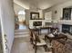 Welcoming living room featuring tile flooring, high ceilings, and an open layout at 10968 Geyser Peak St, Henderson, NV 89052