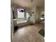 Bathroom featuring a bathtub, shower, and decorative accents at 11457 Steponia Bay St, Las Vegas, NV 89141