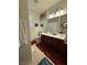 Bathroom with double sink vanity and tile floor at 11457 Steponia Bay St, Las Vegas, NV 89141
