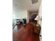 An upper-level landing features wood floors and ample space at 11457 Steponia Bay St, Las Vegas, NV 89141