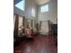 Bright and airy living room with soaring ceilings and large windows at 11457 Steponia Bay St, Las Vegas, NV 89141