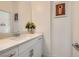 Bright half bathroom with a modern sink and vanity at 130 W Fairway Rd, Henderson, NV 89015