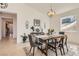 Open dining area offering modern decor, neutral colors, and plentiful natural light at 130 W Fairway Rd, Henderson, NV 89015