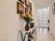 Elegant home hallway with stylish decor and bright, welcoming atmosphere, and white paneled doors at 130 W Fairway Rd, Henderson, NV 89015