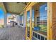 This covered patio features a sauna, outdoor BBQ, ceiling fan, and ample space for outdoor entertaining at 130 W Fairway Rd, Henderson, NV 89015