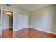 View of the bedroom featuring hardwood floors and a closet with sliding doors at 1405 S Nellis Blvd # 2117, Las Vegas, NV 89104