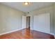 This bedroom showcases hardwood floors, a closet with sliding doors, and easy access to the hall at 1405 S Nellis Blvd # 2117, Las Vegas, NV 89104