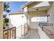 Private entryway to home features stucco walls, terracotta tiled roof, and secure front door at 1405 S Nellis Blvd # 2117, Las Vegas, NV 89104