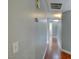 Hallway with wood flooring and light gray walls provides a calm and inviting transition between rooms at 1405 S Nellis Blvd # 2117, Las Vegas, NV 89104