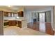 Modern kitchen includes stainless steel appliances, breakfast bar, and dark wood cabinetry at 1405 S Nellis Blvd # 2117, Las Vegas, NV 89104
