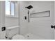 Modern bathroom with sleek walk-in shower, rainfall shower head, and neutral textures at 1638 Candice St, Las Vegas, NV 89156