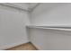 Walk-in closet featuring multiple metal bars and one shelf for optimal storage at 1638 Candice St, Las Vegas, NV 89156