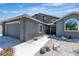 Charming single-story home featuring drought resistant landscaping and a two-car garage at 1638 Candice St, Las Vegas, NV 89156