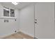 Laundry room with hookups and a white door at 1638 Candice St, Las Vegas, NV 89156