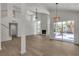 This airy living room showcases wood floors, and a fireplace, and is connected to the outdoor area at 1638 Candice St, Las Vegas, NV 89156