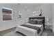 Inviting bedroom with soft lighting, a well-made bed, and modern design elements at 164 Cabo Cruces Dr, Henderson, NV 89011
