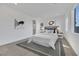 Cozy bedroom with ample natural light, a comfortable bed, and stylish decor at 164 Cabo Cruces Dr, Henderson, NV 89011