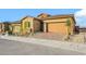 Charming single-story home with a two-car garage and landscaped front yard at 164 Cabo Cruces Dr, Henderson, NV 89011