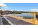 This is a view of the community's lake, with the walking path, dock, boat rentals and community buildings at 164 Cabo Cruces Dr, Henderson, NV 89011