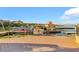This is a view of the community's lake, including boat rentals, the dock, and walking paths, all set in the desert at 164 Cabo Cruces Dr, Henderson, NV 89011
