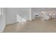 Bright and open living space with clean lines and seamless transition to the modern kitchen at 164 Cabo Cruces Dr, Henderson, NV 89011