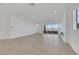 Expansive living area has tile floors, recessed lighting, and a contemporary fireplace at 164 Cabo Cruces Dr, Henderson, NV 89011