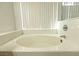 Close up of the bathtub showing the tile surround at 1721 Mill Canyon Dr, Las Vegas, NV 89128