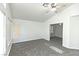 Spacious bedroom with vaulted ceiling, plush carpet, and bright natural light at 1721 Mill Canyon Dr, Las Vegas, NV 89128