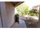Inviting front yard featuring desert landscaping, mature trees, and a welcoming entryway at 1721 Mill Canyon Dr, Las Vegas, NV 89128