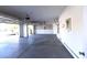 A clean and organized garage showcasing an open interior for parking and storage at 1721 Mill Canyon Dr, Las Vegas, NV 89128