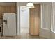 The kitchen has tile flooring, oak cabinets and a view of the living room at 1721 Mill Canyon Dr, Las Vegas, NV 89128