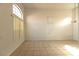 Bright living room featuring tile floors and large windows at 1721 Mill Canyon Dr, Las Vegas, NV 89128