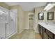 Bathroom featuring a standing shower and double sink vanity at 1976 Galleria Spada St, Henderson, NV 89044