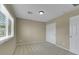 Carpeted bedroom with a window, closet, neutral colors, and modern ceiling light at 1976 Galleria Spada St, Henderson, NV 89044