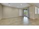 Bright dining room with tile flooring and sliding door access to the outdoor patio at 1976 Galleria Spada St, Henderson, NV 89044