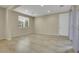 Well-lit dining room with tile flooring, a large window, and neutral wall colors at 1976 Galleria Spada St, Henderson, NV 89044