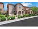 Charming stucco home featuring manicured landscaping and a welcoming front entrance at 1976 Galleria Spada St, Henderson, NV 89044