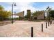 Inviting park scene with a stage, walking paths, manicured landscaping, and a comfortable seating area at 1976 Galleria Spada St, Henderson, NV 89044