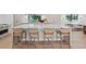 Island with seating in gourmet kitchen featuring modern fixtures and stainless steel appliances at 204 Canyon Dr, Las Vegas, NV 89107