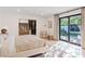 Bright bedroom with a walk-in closet, neutral decor, and access to a private outdoor space at 204 Canyon Dr, Las Vegas, NV 89107