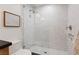 Modern shower with marble tile, glass door, and built-in niche at 204 Canyon Dr, Las Vegas, NV 89107