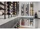 Elegant wine cellar boasting custom racks and shelving for organized storage of wine bottles at 204 Canyon Dr, Las Vegas, NV 89107
