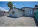 Backyard featuring a gravel area with a chainlink fence at 215 Zinc St, Henderson, NV 89015