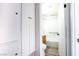 This bathroom is conveniently located near built-in shelving and offers a clean, functional space for residents at 215 Zinc St, Henderson, NV 89015