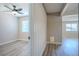 Hallway with a bedroom door visible leading to living room and bedroom at 215 Zinc St, Henderson, NV 89015