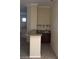 Elegant bar area featuring granite countertops and custom cabinetry at 2175 Clearwater Lake Dr, Henderson, NV 89044