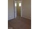 Bedroom with open door to the hallway at 2175 Clearwater Lake Dr, Henderson, NV 89044