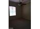 Bedroom with a ceiling fan and bright window at 2175 Clearwater Lake Dr, Henderson, NV 89044