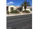 Well-maintained single-story home with a two-car garage and drought-tolerant landscaping at 2175 Clearwater Lake Dr, Henderson, NV 89044